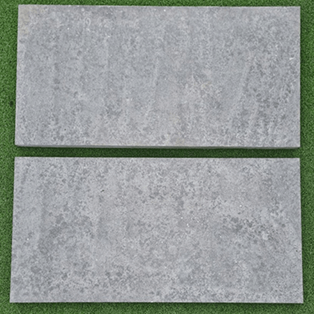 two pavers on grass