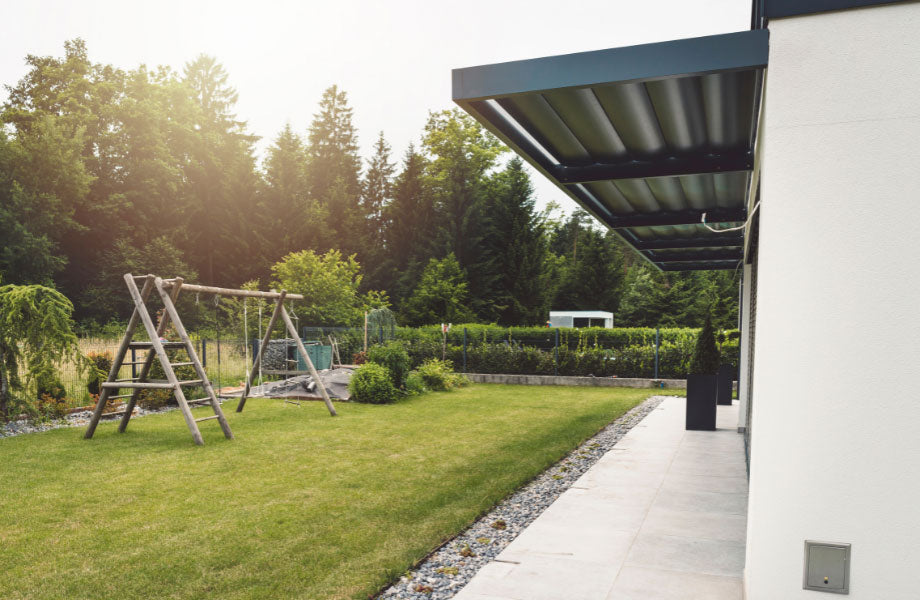 a beautiful lawn in a family backyard for tips for measuring for laying lawn