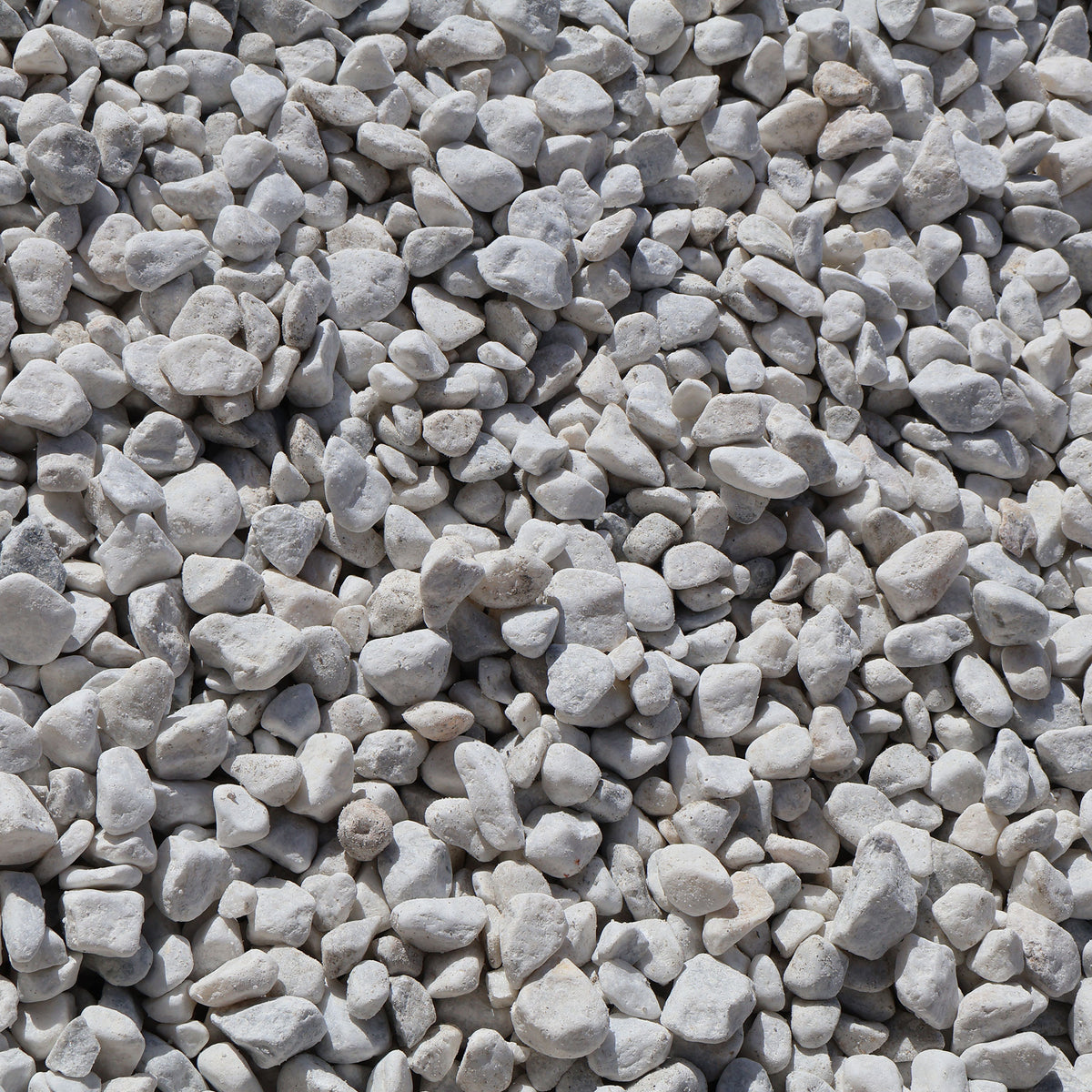 Alpine white gravel 20mm from Wilmots Stone & Soil, showing smooth, rounded white rocks suitable for landscaping and pathways.