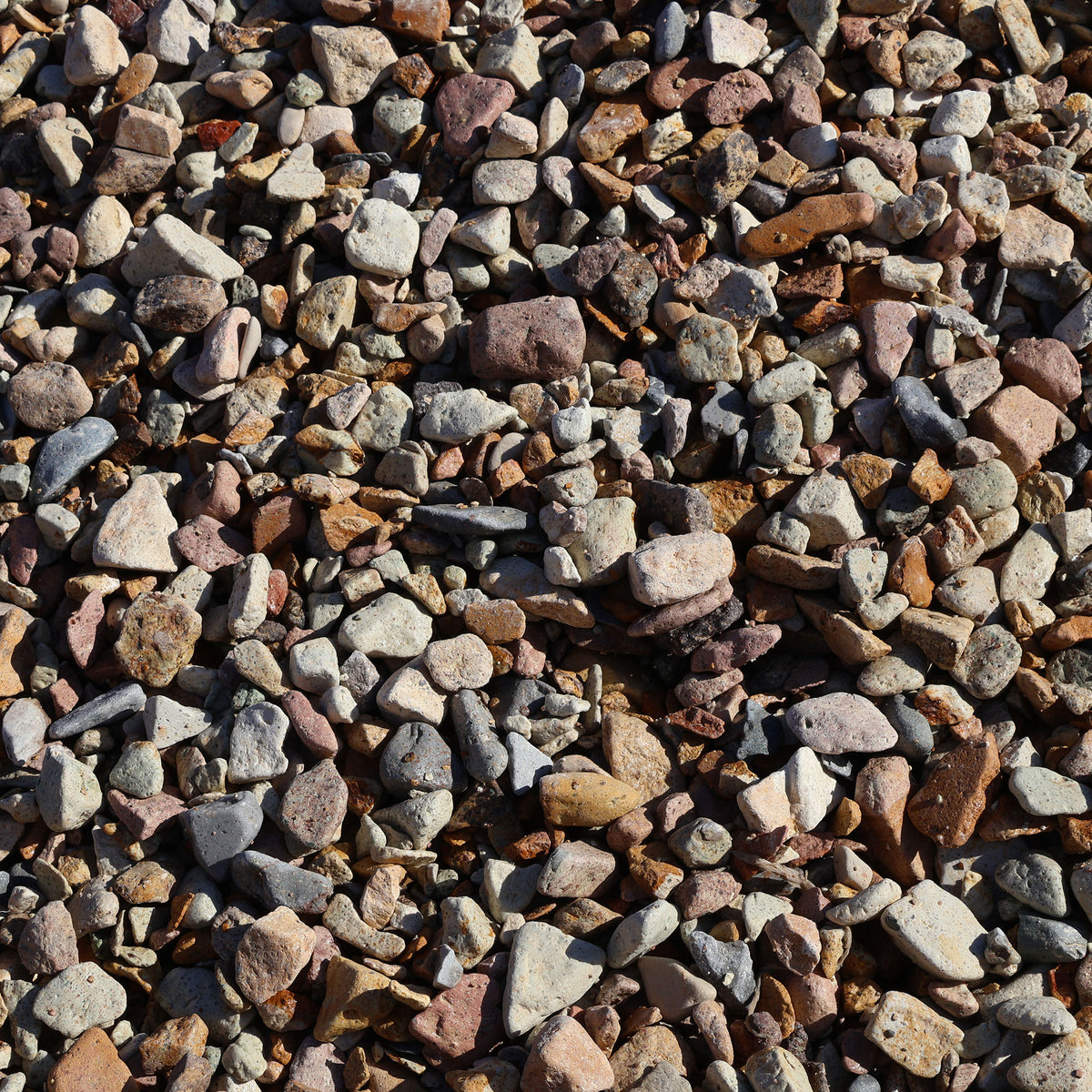 Bellagio Brisbane Tuff Stone Pebbles, 20-50mm, natural rock landscaping stones shown in a close-up image.