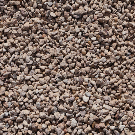 A close-up of Ablatio Crushed Sandstone rocks, 8-12mm size, showing natural crushed stone texture from Rock n Soil.