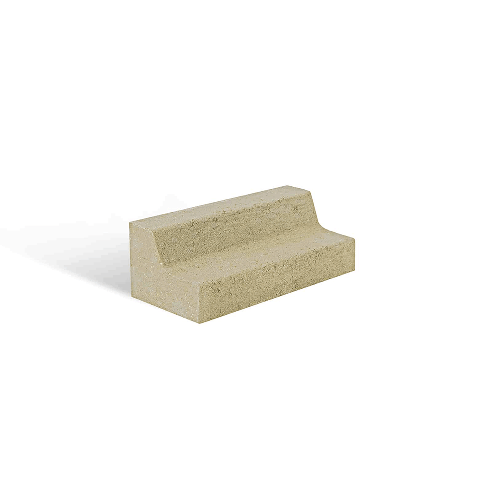 Beige concrete block on a white background