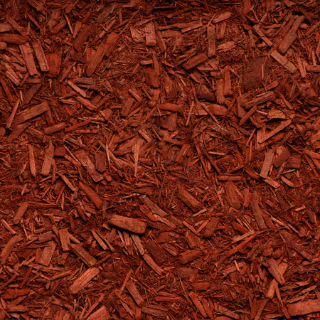 Close-up of red mulch with a textured pattern