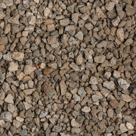 Close-up of small gravel stones with various shades of brown and gray.