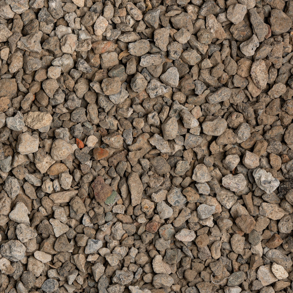 Close-up of small gravel stones with various shades of brown and gray.