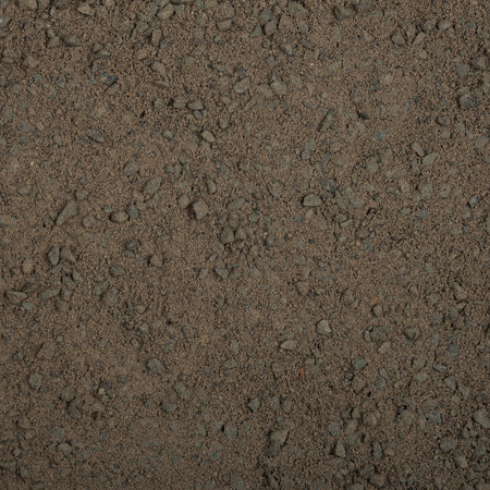 Close-up of textured brown surface with small stones