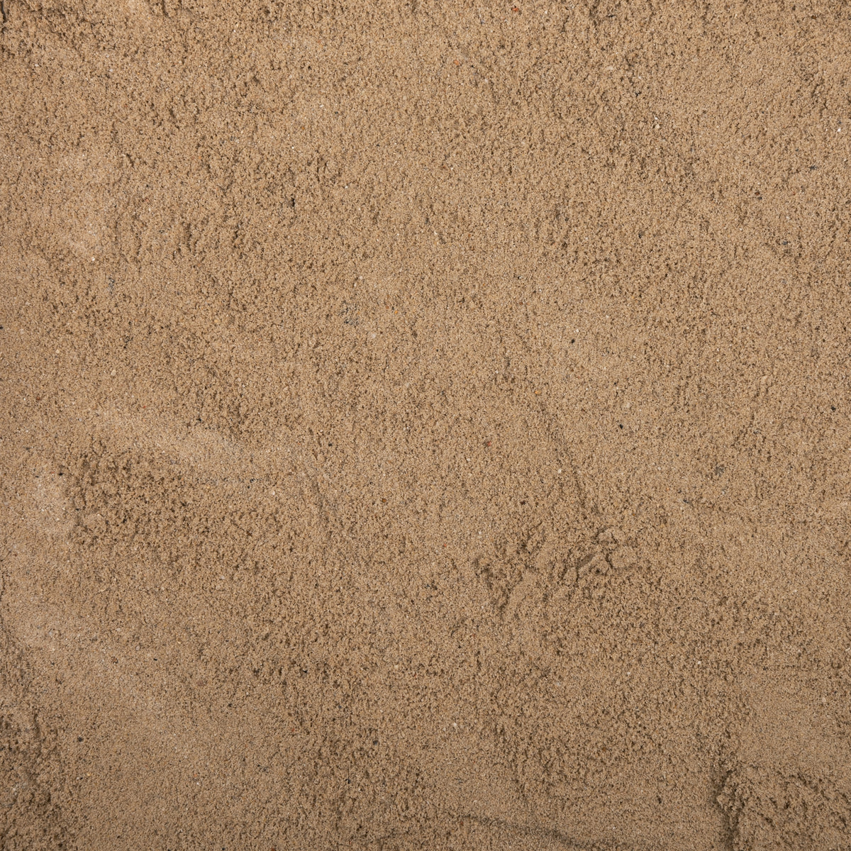 Close-up of sand with a textured pattern