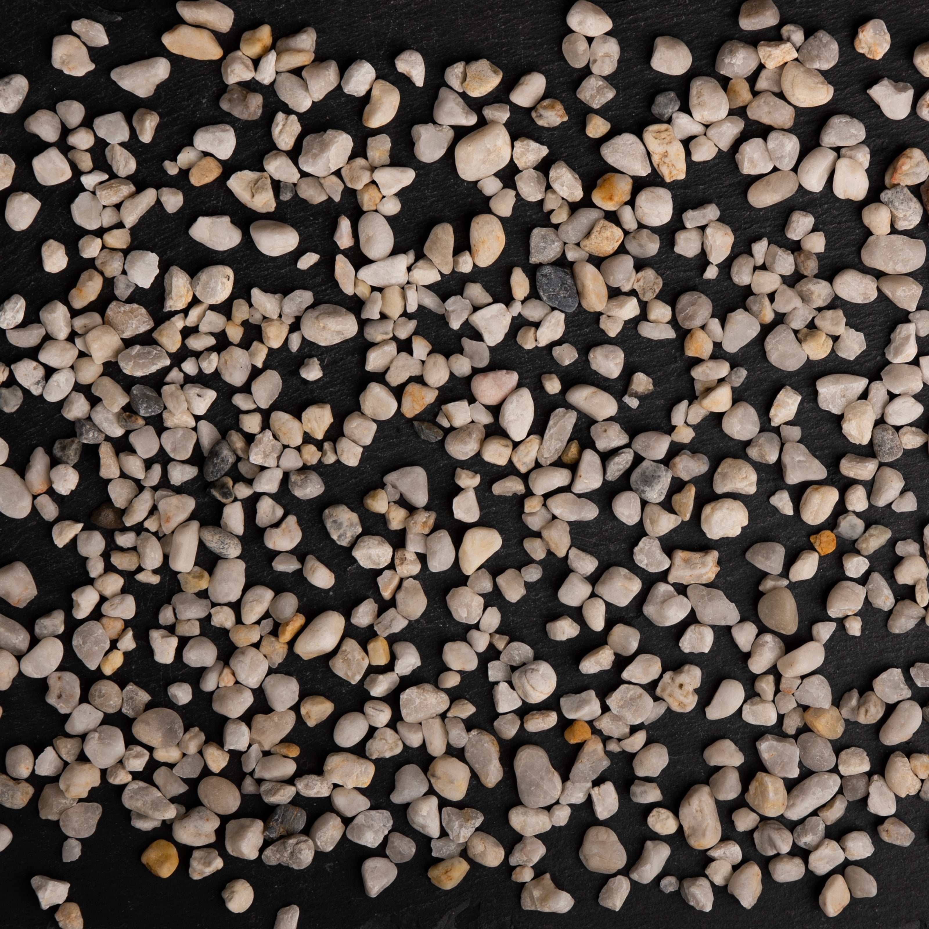 Small pebbles on a black background