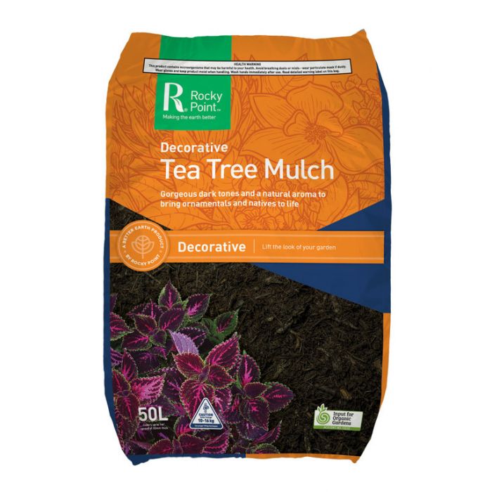 Rocky Point Tea Tree Mulch ground covering with fresh green tea tree foliage for garden landscaping and weed control.